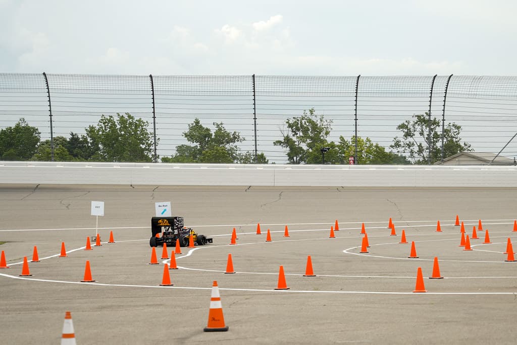 Car navigating the autocross cone course